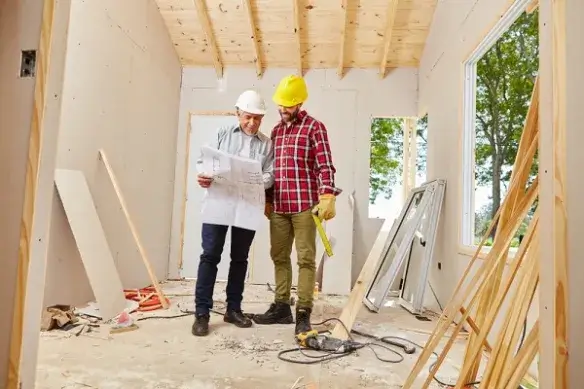 Contractors reviewing plans for Builders Wanaka's Renovations Wanaka projects.