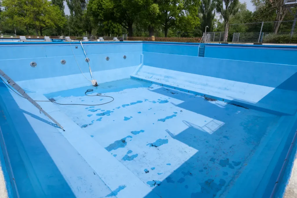 Large commercial pool reflecting premium Swimming Pool Renovations Wanaka services from Builders Wanaka.